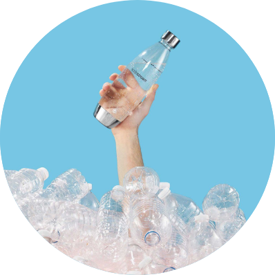 a hand holds a bottle